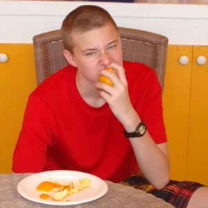 Ryan enjoying an Orange