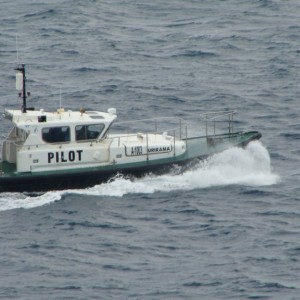 Pilot boat follows us in