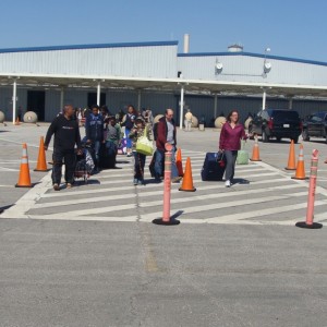 Passengers exit the terminal