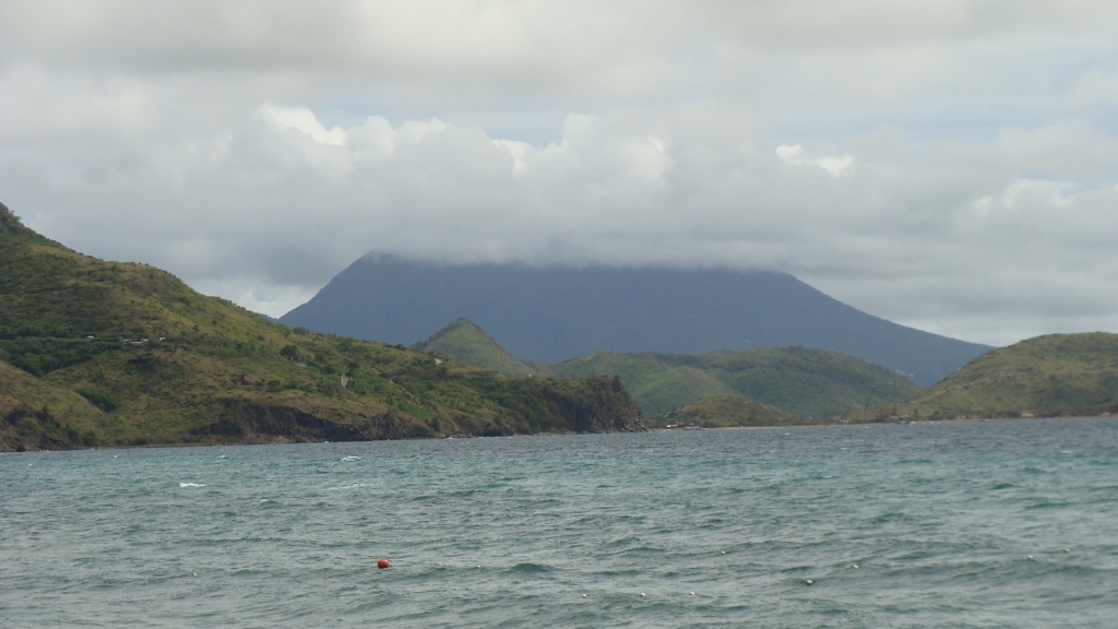 Cloud covered island of Nevis in the distance