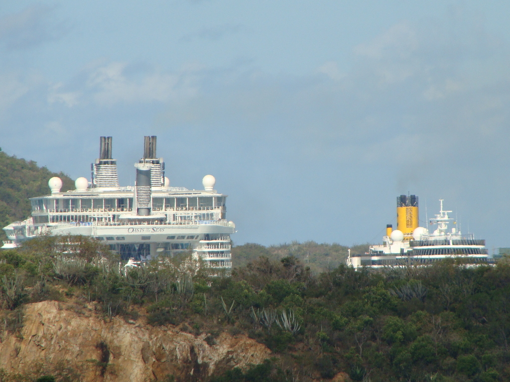 Oasis and Costa ship docked at Crown Bay