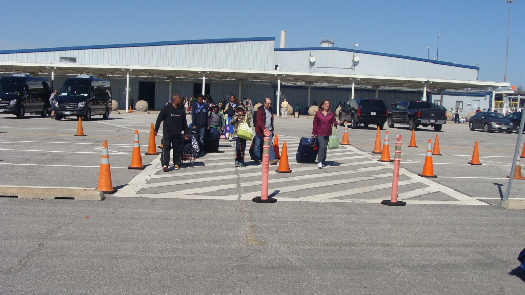 Passengers exit the terminal