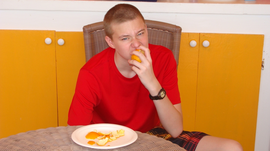 Ryan enjoying an Orange