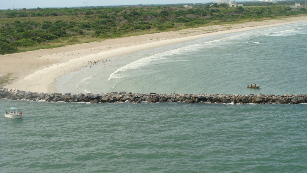 Sailing past the jetty