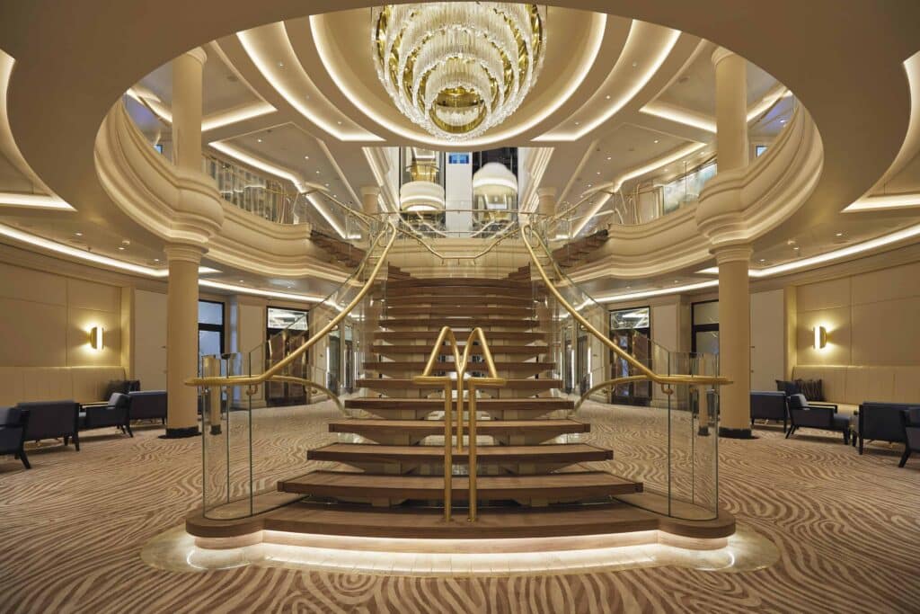 The sparkling atrium staircase on Regent Seven Seas Splendor